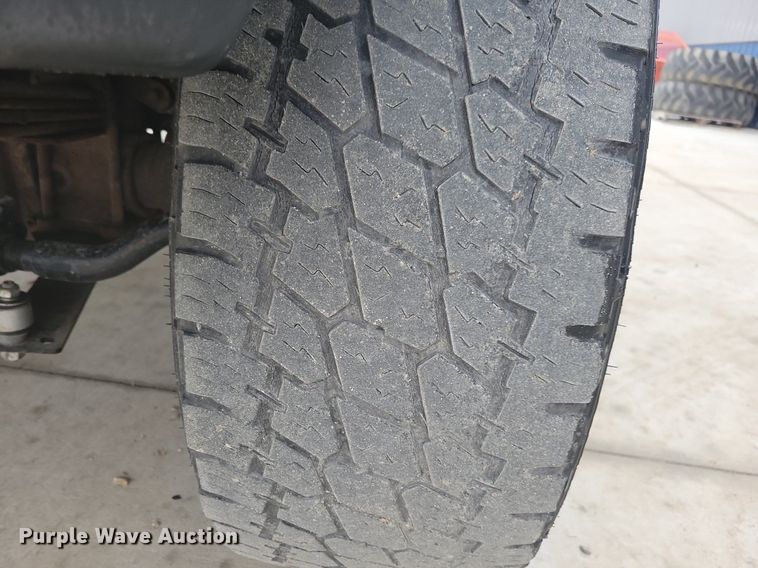 image for item IO9398 2004 Ford F250 Super Duty Lariat  Crew Cab pickup truck