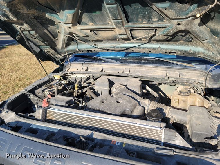 image for item LN9729 2011 Ford F350 Super Duty  Crew Cab flatbed pickup truck