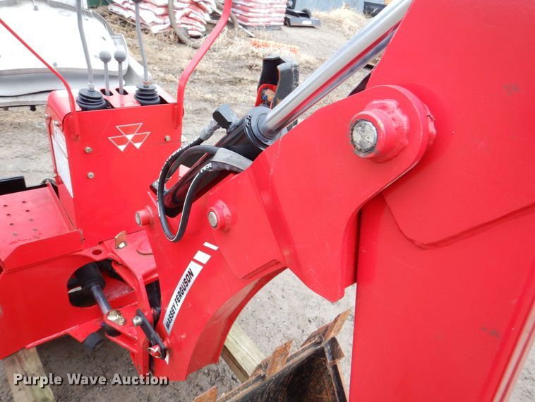 image for item MC9805 Massey Ferguson CB05  skid steer backhoe attachment