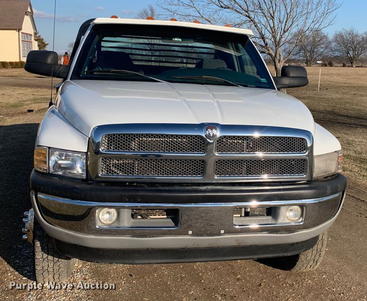 image for item MM9709 1999 Dodge Ram 3500  Quad Cab flatbed pickup truck