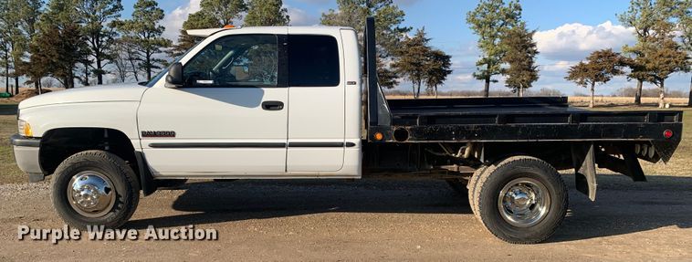 image for item MM9709 1999 Dodge Ram 3500  Quad Cab flatbed pickup truck