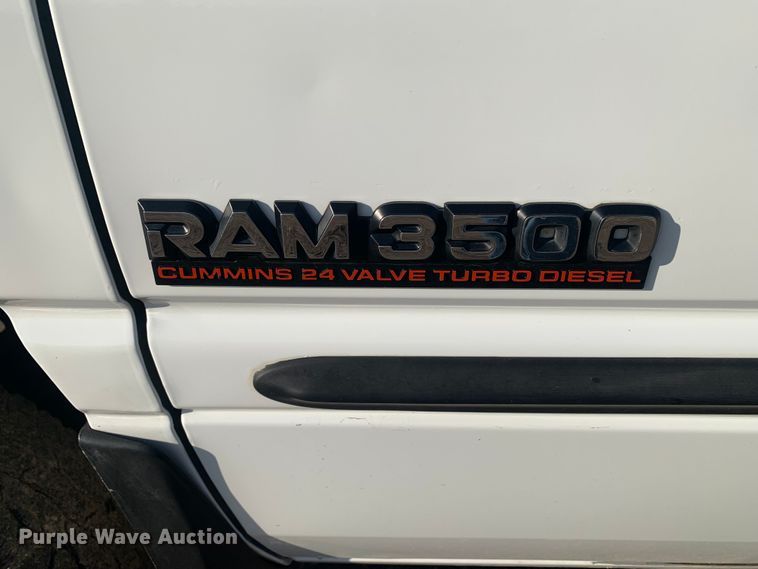 image for item MM9709 1999 Dodge Ram 3500  Quad Cab flatbed pickup truck