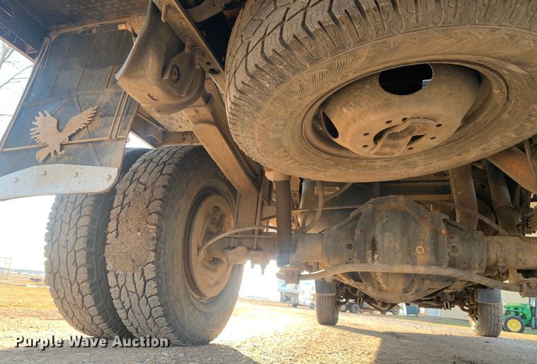 image for item MM9709 1999 Dodge Ram 3500  Quad Cab flatbed pickup truck