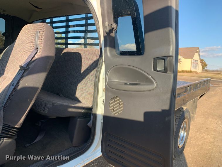 image for item MM9709 1999 Dodge Ram 3500  Quad Cab flatbed pickup truck