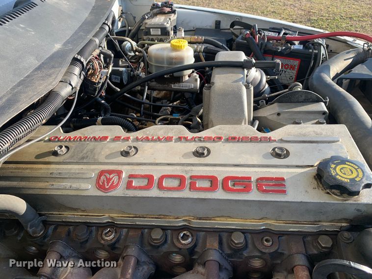 image for item MM9709 1999 Dodge Ram 3500  Quad Cab flatbed pickup truck