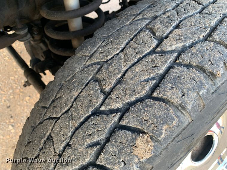 image for item MM9709 1999 Dodge Ram 3500  Quad Cab flatbed pickup truck