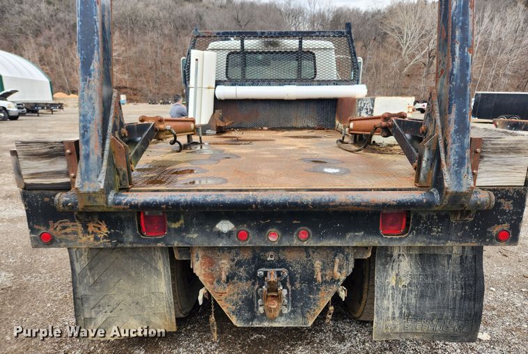 image for item JB9638 1999 International 4900  flatbed truck