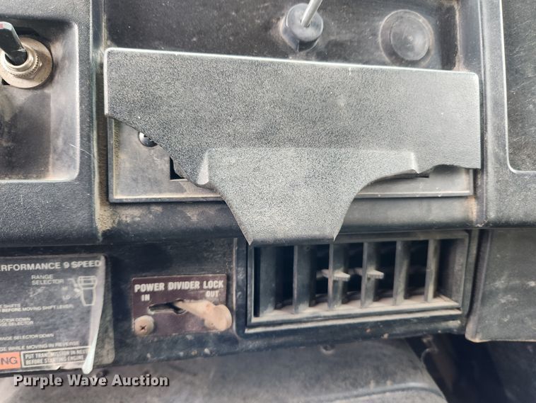 image for item KT9370 1990 International 4900  flatbed truck with forklift