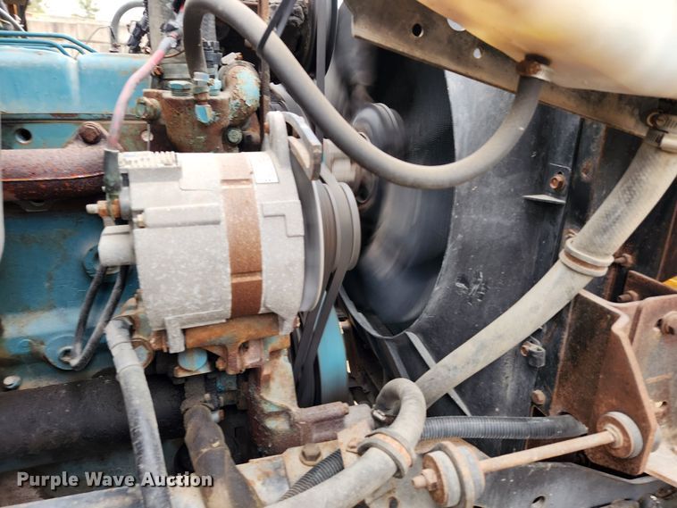 image for item KT9370 1990 International 4900  flatbed truck with forklift