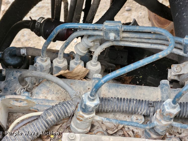 image for item KT9370 1990 International 4900  flatbed truck with forklift