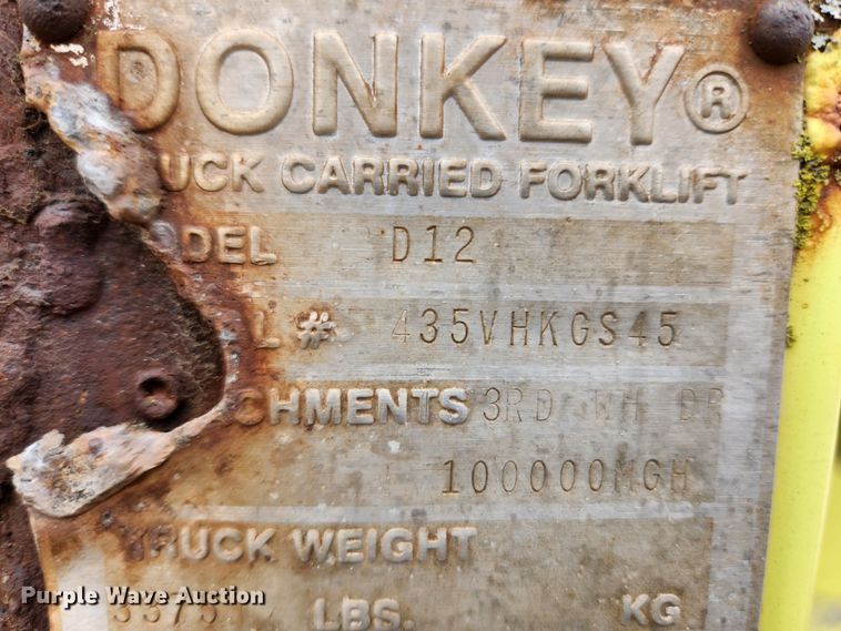 image for item KT9370 1990 International 4900  flatbed truck with forklift