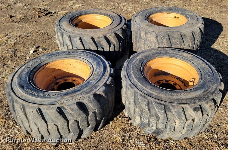 image for item MC9537 (4) 33x15.5-16.5 skid steer tires and wheels