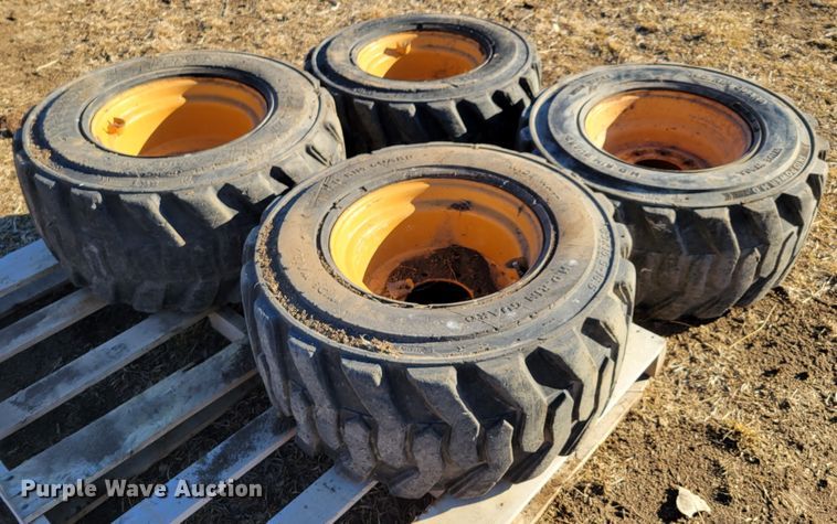 image for item MC9537 (4) 33x15.5-16.5 skid steer tires and wheels