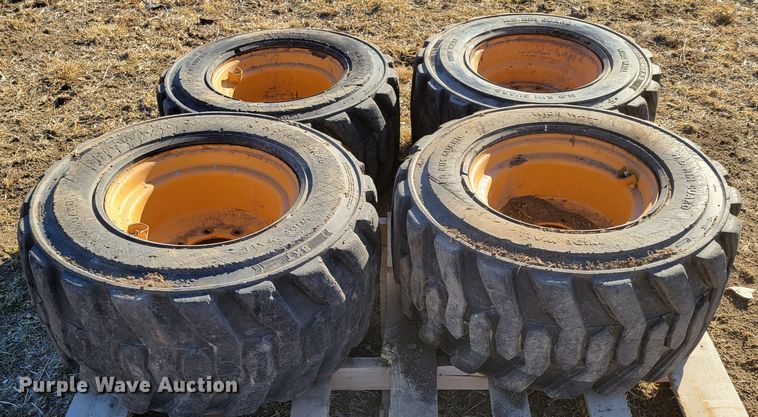 image for item MC9537 (4) 33x15.5-16.5 skid steer tires and wheels