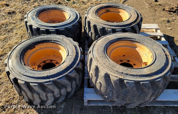 image for item MC9537 (4) 33x15.5-16.5 skid steer tires and wheels