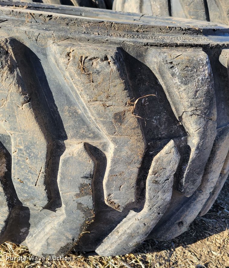 image for item MC9537 (4) 33x15.5-16.5 skid steer tires and wheels