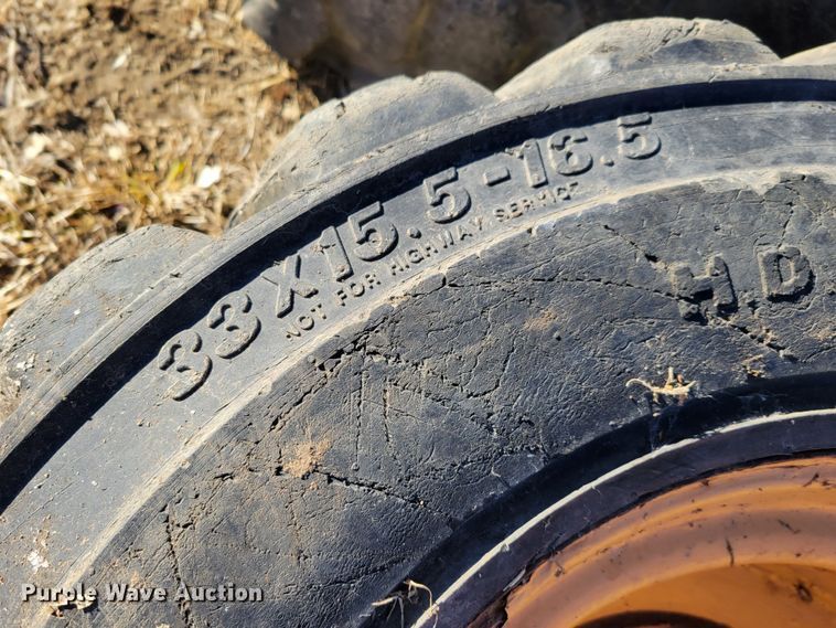 image for item MC9537 (4) 33x15.5-16.5 skid steer tires and wheels