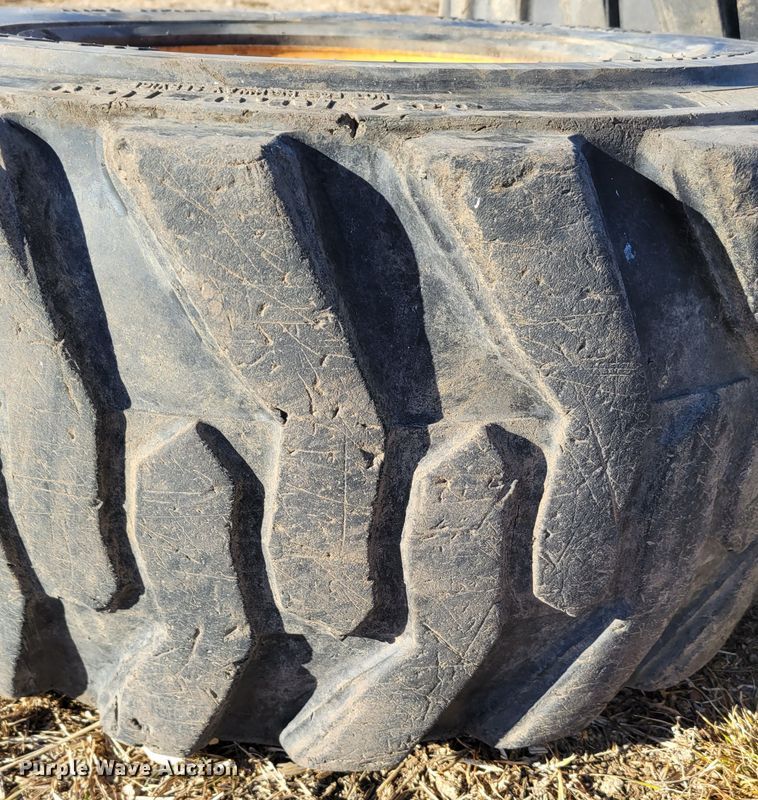 image for item MC9537 (4) 33x15.5-16.5 skid steer tires and wheels