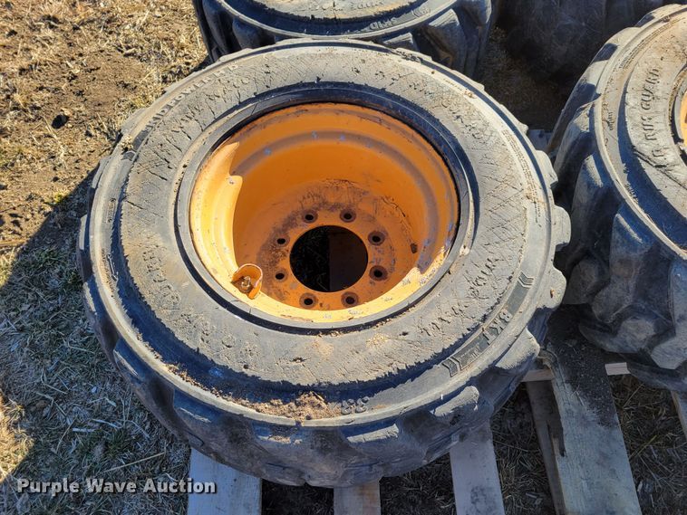 image for item MC9537 (4) 33x15.5-16.5 skid steer tires and wheels