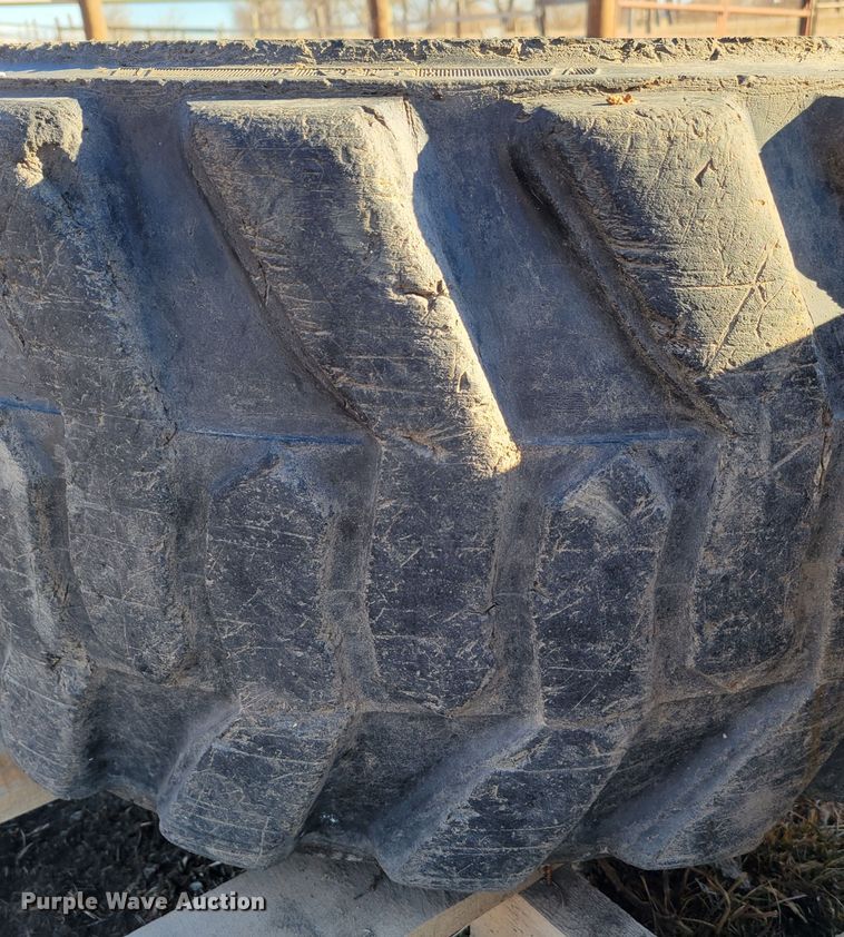 image for item MC9537 (4) 33x15.5-16.5 skid steer tires and wheels