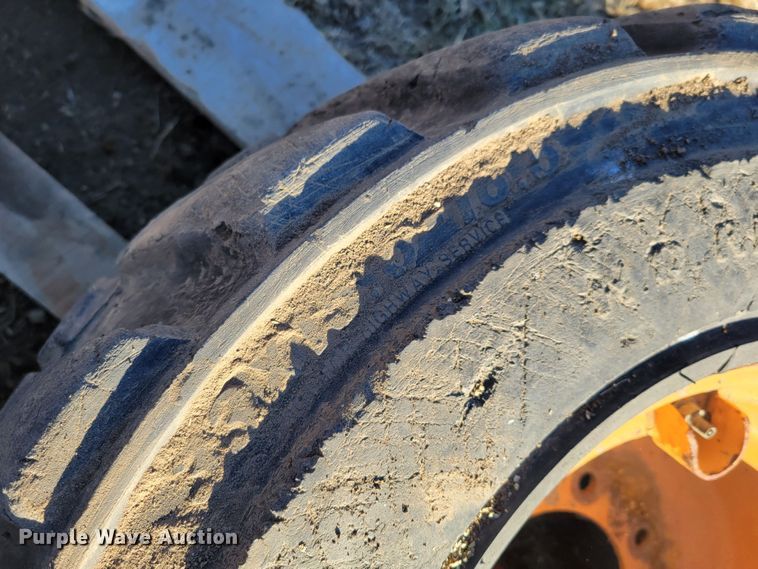 image for item MC9537 (4) 33x15.5-16.5 skid steer tires and wheels