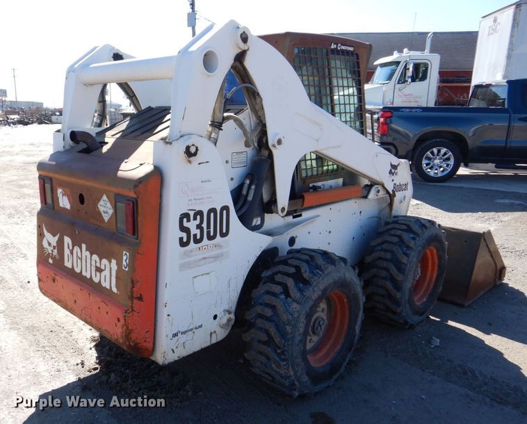 image for item MC9795 2003 Bobcat S300  skid steer loader