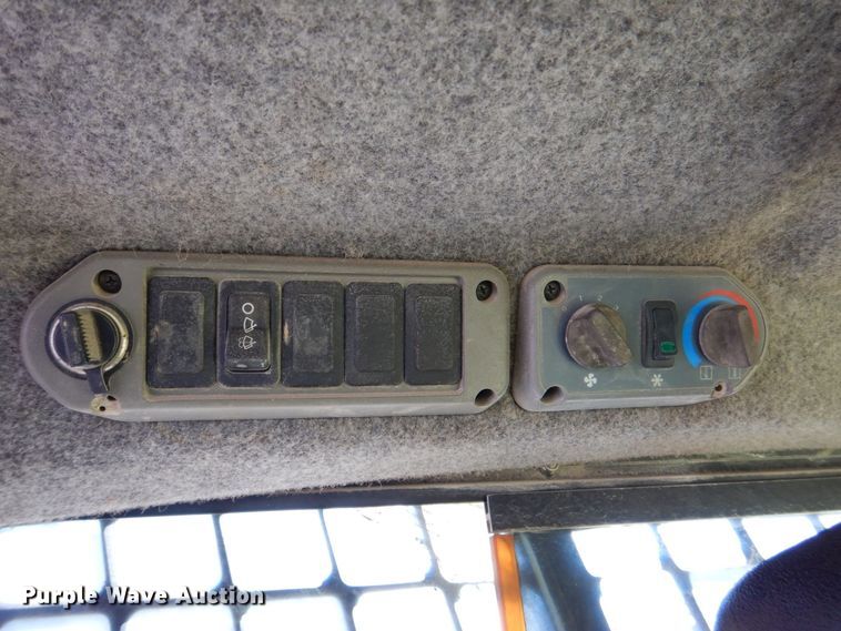 image for item MC9795 2003 Bobcat S300  skid steer loader