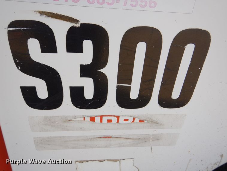 image for item MC9795 2003 Bobcat S300  skid steer loader