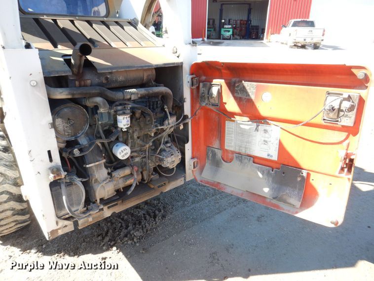 image for item MC9795 2003 Bobcat S300  skid steer loader