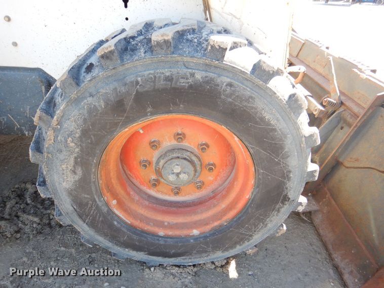 image for item MC9795 2003 Bobcat S300  skid steer loader