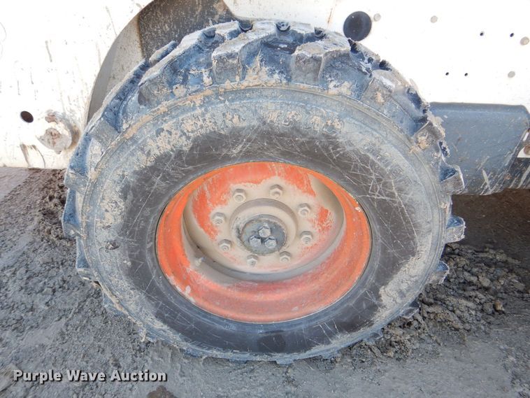 image for item MC9795 2003 Bobcat S300  skid steer loader