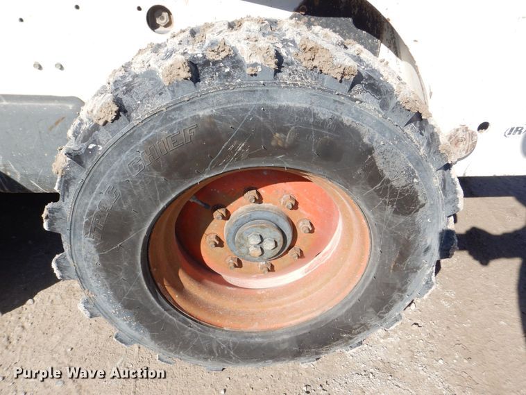 image for item MC9795 2003 Bobcat S300  skid steer loader