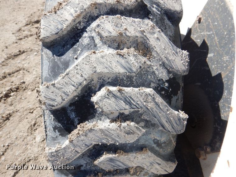 image for item MC9795 2003 Bobcat S300  skid steer loader