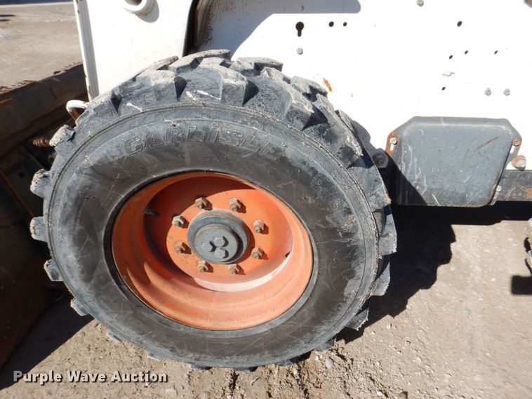 image for item MC9795 2003 Bobcat S300  skid steer loader