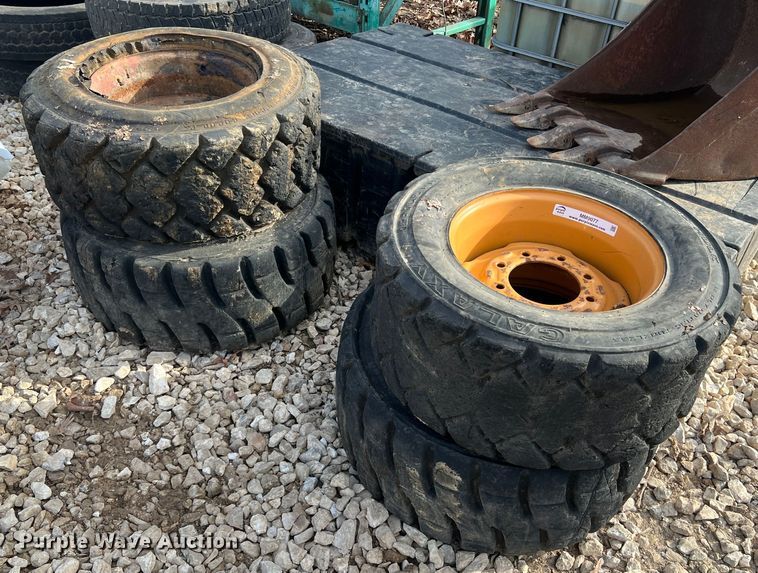 image for item MM9077 (4) 12x16.5 NHS tires and wheels
