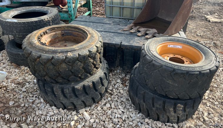 image for item MM9077 (4) 12x16.5 NHS tires and wheels