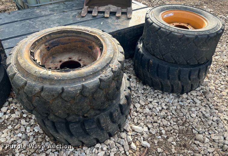 image for item MM9077 (4) 12x16.5 NHS tires and wheels