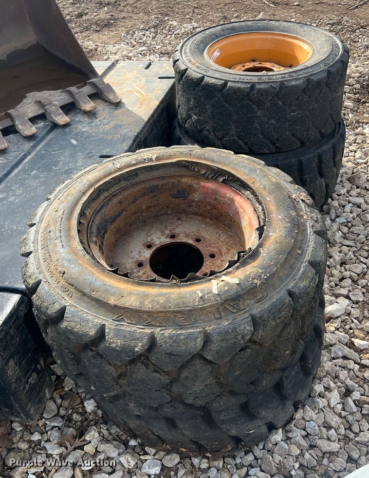 image for item MM9077 (4) 12x16.5 NHS tires and wheels