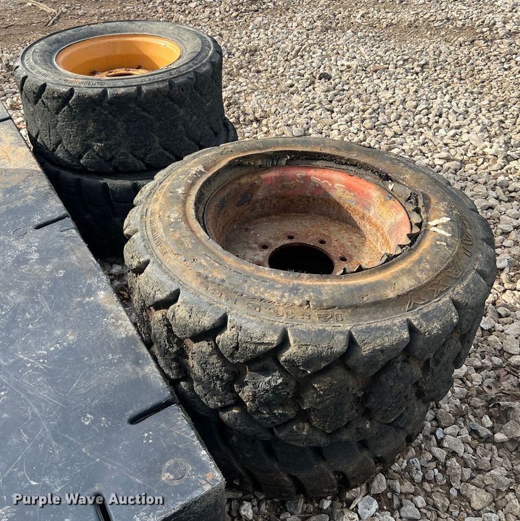 image for item MM9077 (4) 12x16.5 NHS tires and wheels
