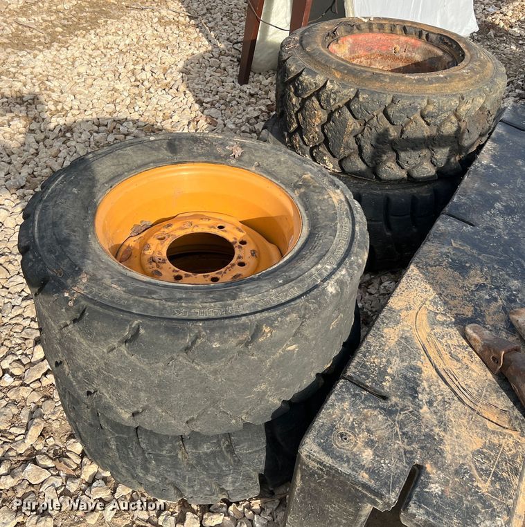 image for item MM9077 (4) 12x16.5 NHS tires and wheels