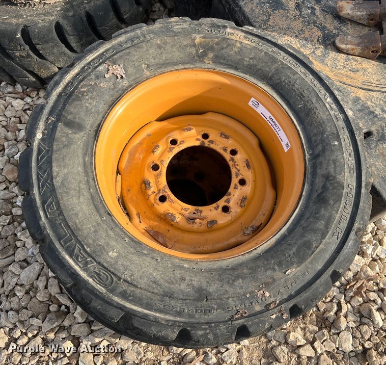 image for item MM9077 (4) 12x16.5 NHS tires and wheels