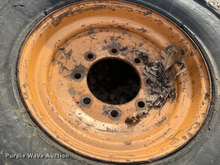 image for item MM9077 (4) 12x16.5 NHS tires and wheels