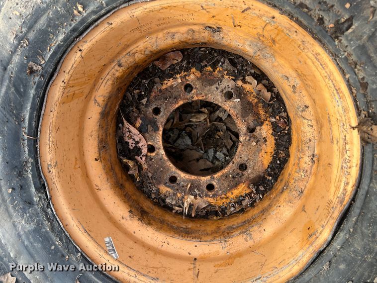 image for item MM9077 (4) 12x16.5 NHS tires and wheels