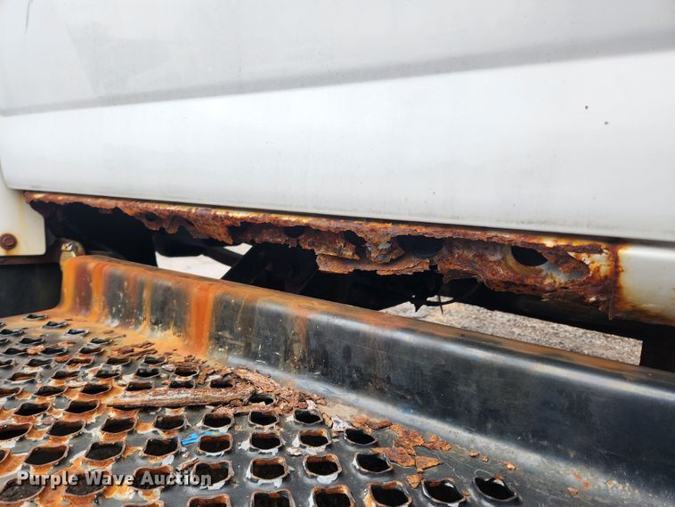 image for item JB9563 2004 GMC C5500  flatbed truck