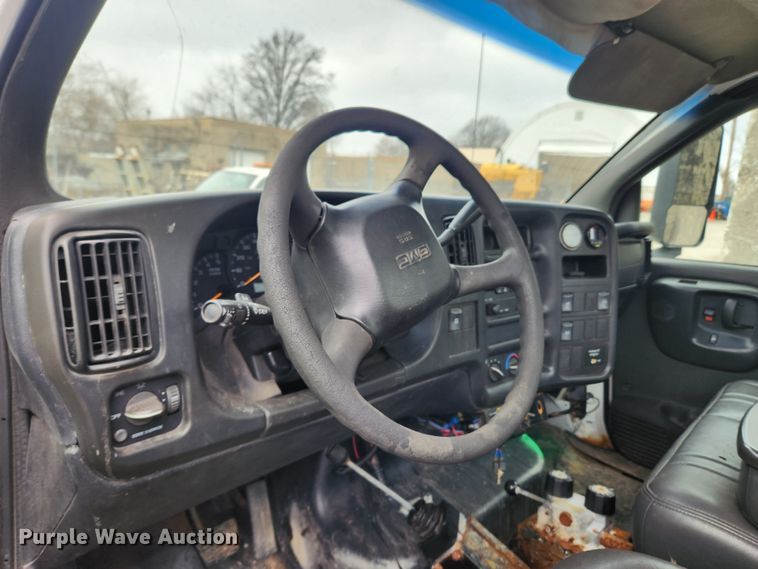 image for item JB9563 2004 GMC C5500  flatbed truck