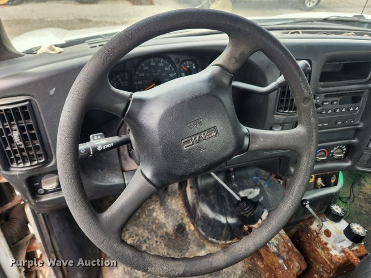 image for item JB9563 2004 GMC C5500  flatbed truck