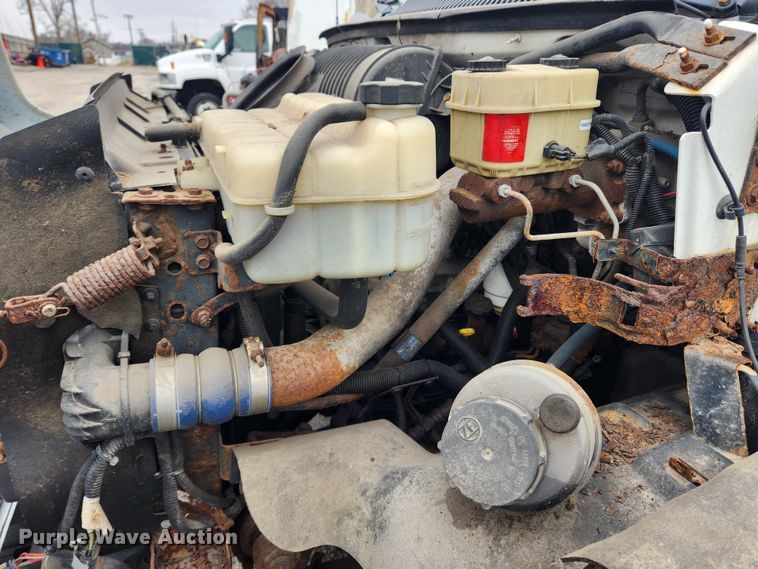 image for item JB9563 2004 GMC C5500  flatbed truck