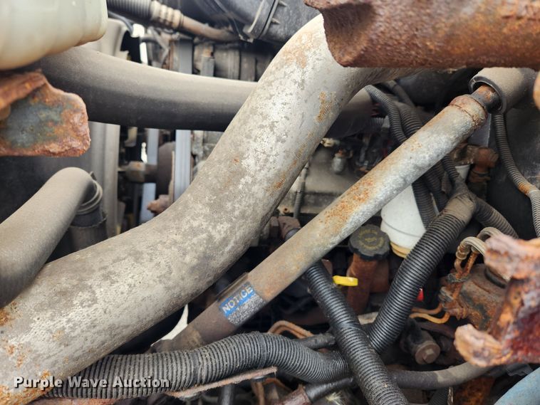 image for item JB9563 2004 GMC C5500  flatbed truck