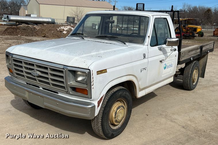 image for item KR9591 1984 Ford F250  flatbed pickup truck