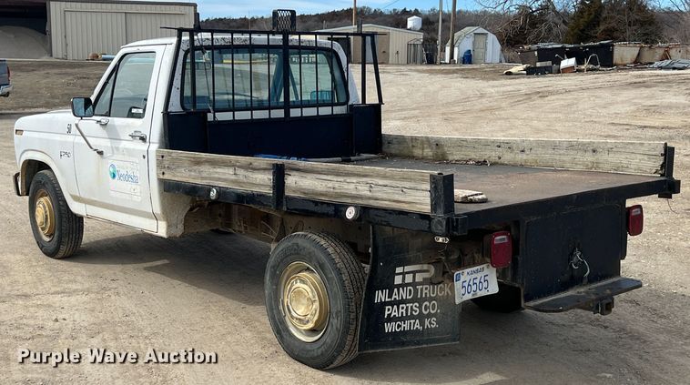 image for item KR9591 1984 Ford F250  flatbed pickup truck
